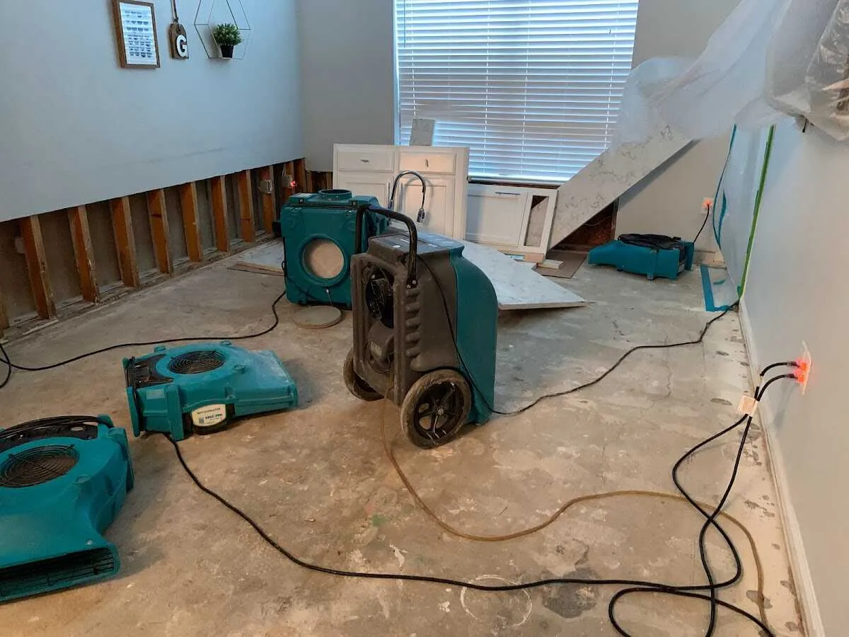 Dehumidifier in flood-cut room for Water Damage Restoration in Midway